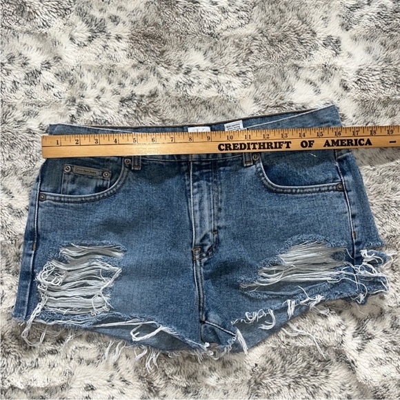 Vintage handcrafted Calvin Klein distressed jean shorts - Picture 5 of 7